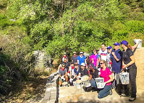 Volunteers repairing the Great Wall